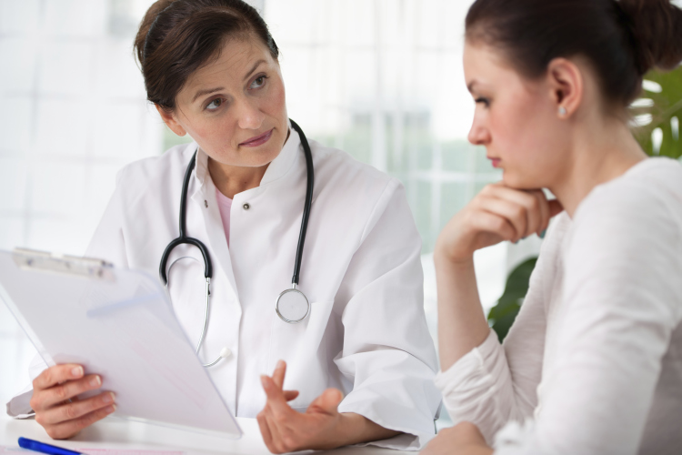 doctor with female patient